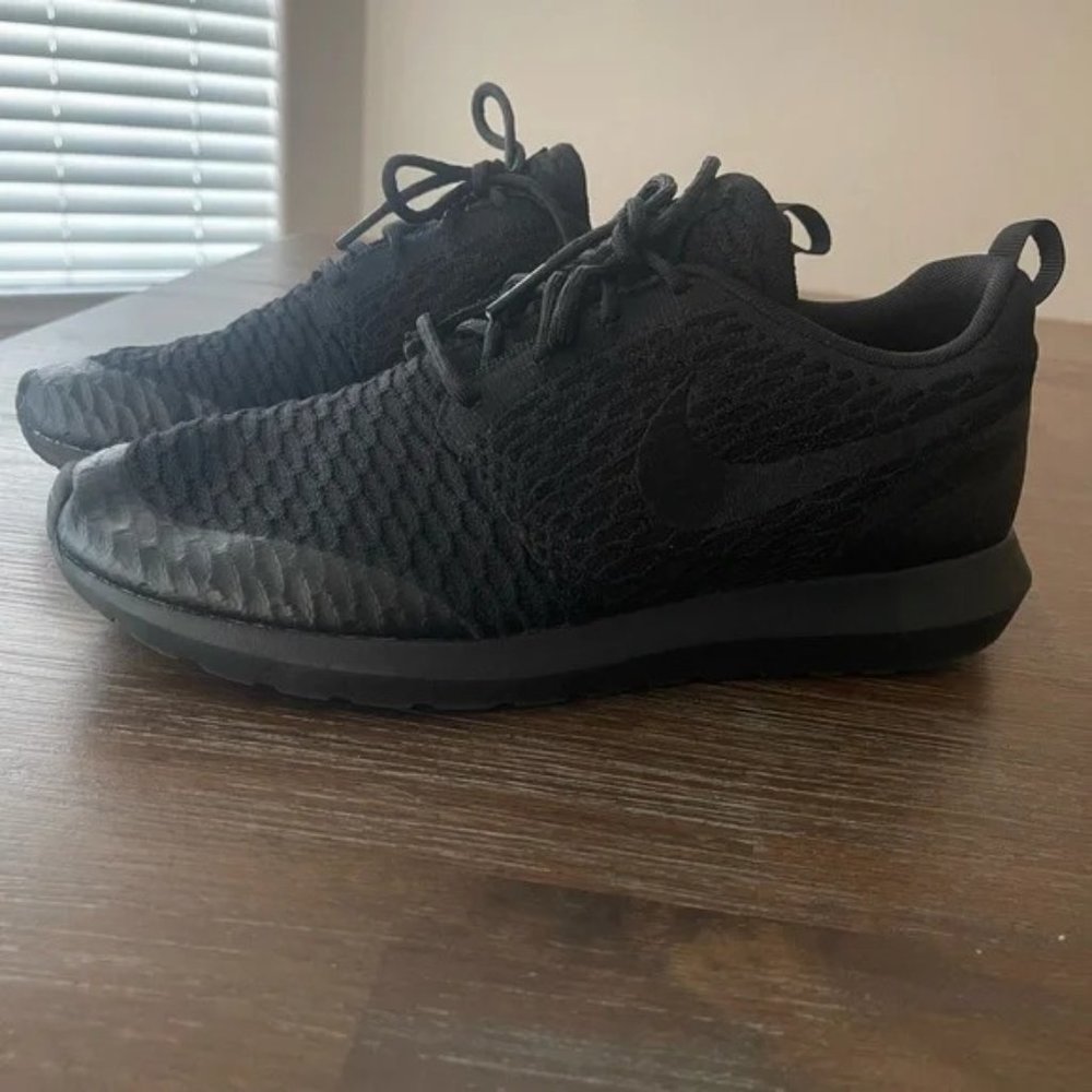 Woman’s Nike black running shoes size 8